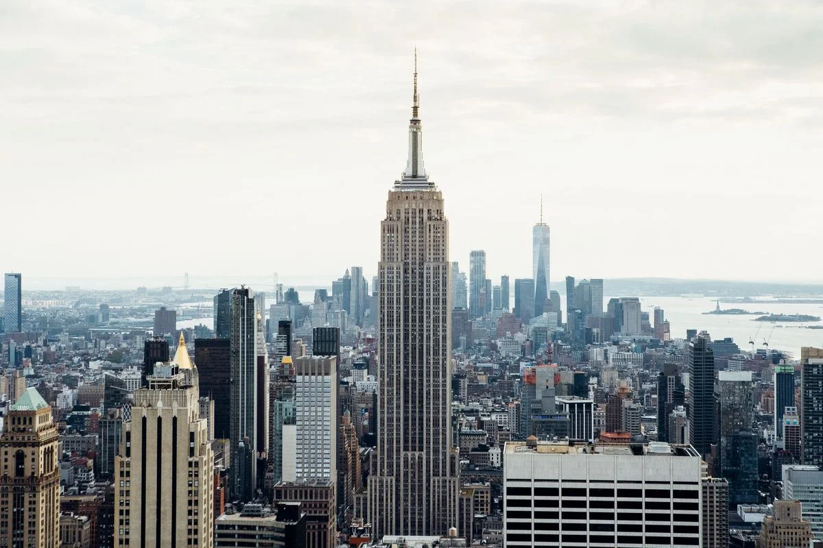 Two People Scale Empire State Building in New York